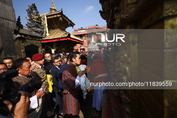 Bhutanese King Jigme Khesar Namgyel Wangchuk (center) performs rituals at Swayambhunath Stupa, a UNESCO World Heritage Site, during a five-h...