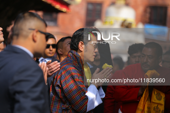 Bhutanese King Jigme Khesar Namgyel Wangchuk (center) performs rituals at Swayambhunath Stupa, a UNESCO World Heritage Site, during a five-h...