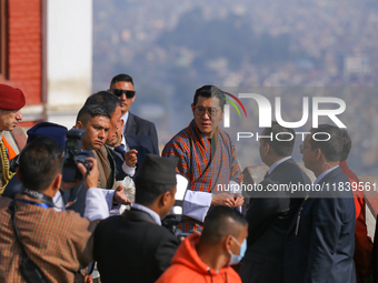 Bhutanese King Jigme Khesar Namgyel Wangchuk (center) overlooks the Kathmandu Valley from the viewpoint at Swayambhunath Stupa, a UNESCO Wor...