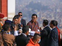 Bhutanese King Jigme Khesar Namgyel Wangchuk (center) overlooks the Kathmandu Valley from the viewpoint at Swayambhunath Stupa, a UNESCO Wor...