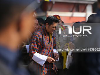 Bhutanese King Jigme Khesar Namgyel Wangchuk (center) interacts with locals at Swayambhunath Stupa, a UNESCO World Heritage Site, in Kathman...