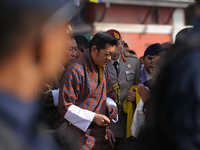 Bhutanese King Jigme Khesar Namgyel Wangchuk (center) interacts with locals at Swayambhunath Stupa, a UNESCO World Heritage Site, in Kathman...