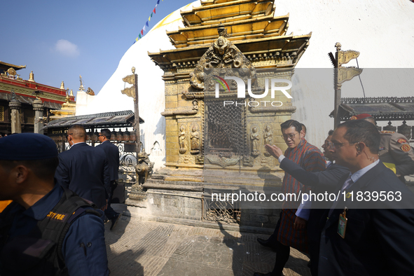 Bhutanese King Jigme Khesar Namgyel Wangchuk (right) tours Swayambhunath Stupa, a UNESCO World Heritage Site, during a five-hour transit in...