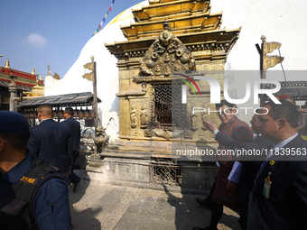 Bhutanese King Jigme Khesar Namgyel Wangchuk (right) tours Swayambhunath Stupa, a UNESCO World Heritage Site, during a five-hour transit in...