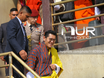 Bhutanese King Jigme Khesar Namgyel Wangchuk (center) tours Swayambhunath Stupa, a UNESCO World Heritage Site, during a five-hour transit in...