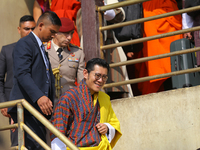 Bhutanese King Jigme Khesar Namgyel Wangchuk (center) tours Swayambhunath Stupa, a UNESCO World Heritage Site, during a five-hour transit in...