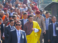 Bhutanese King Jigme Khesar Namgyel Wangchuk (center) tours Swayambhunath Stupa, a UNESCO World Heritage Site, during a five-hour transit in...