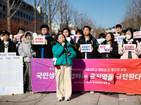 A group of dozens of current students and alumni from Yonsei University holds a press conference condemning President Yoon Suk-yeol's martia...