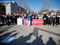 A group of dozens of current students and alumni from Yonsei University holds a press conference condemning President Yoon Suk-yeol's martia...