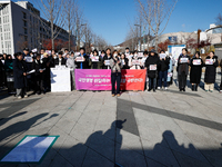 A group of dozens of current students and alumni from Yonsei University holds a press conference condemning President Yoon Suk-yeol's martia...