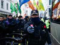 Police set up barricades in front of the People Power Party headquarters, the site of a rally by 11 media organizations, including the Natio...