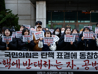 University students hold a protest in front of the People's Power Party headquarters in Seoul, South Korea, on December 6, 2024, condemning...