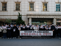 University students hold a protest in front of the People's Power Party headquarters in Seoul, South Korea, on December 6, 2024, condemning...