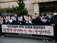 University students hold a protest in front of the People's Power Party headquarters in Seoul, South Korea, on December 6, 2024, condemning...