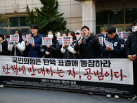 University students hold a protest in front of the People's Power Party headquarters in Seoul, South Korea, on December 6, 2024, condemning...