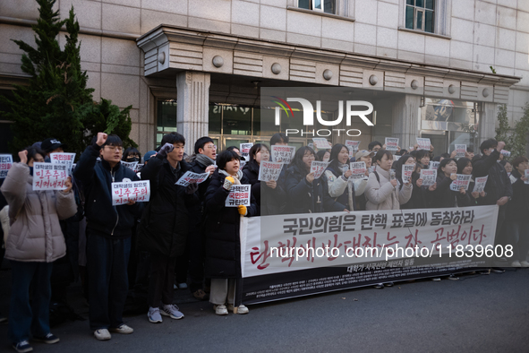 University students hold a protest in front of the People's Power Party headquarters in Seoul, South Korea, on December 6, 2024, condemning...