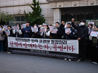 University students hold a protest in front of the People's Power Party headquarters in Seoul, South Korea, on December 6, 2024, condemning...