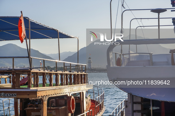 A general view of the city by the sea with a lighthouse in the background is seen in Alanya, Turkey, on November 5, 2024. 