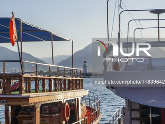 A general view of the city by the sea with a lighthouse in the background is seen in Alanya, Turkey, on November 5, 2024. (