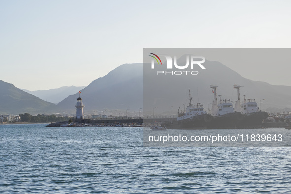 Ships in port by the lighthouse are seen in Alanya, Turkey, on November 6, 2024 