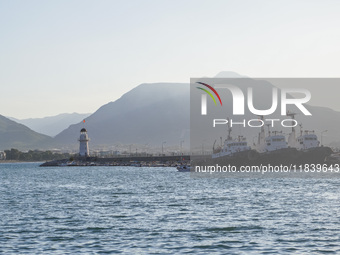 Ships in port by the lighthouse are seen in Alanya, Turkey, on November 6, 2024 (