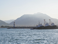 Ships in port by the lighthouse are seen in Alanya, Turkey, on November 6, 2024 (