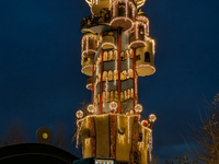 The Kuchlbauer Tower, designed by Friedensreich Hundertwasser, is illuminated for Christmas. In the historic center of Abensberg, Bavaria, G...