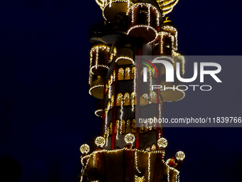 The Kuchlbauer Tower, designed by Friedensreich Hundertwasser, is illuminated for Christmas. In the historic center of Abensberg, Bavaria, G...