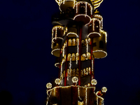 The Kuchlbauer Tower, designed by Friedensreich Hundertwasser, is illuminated for Christmas. In the historic center of Abensberg, Bavaria, G...