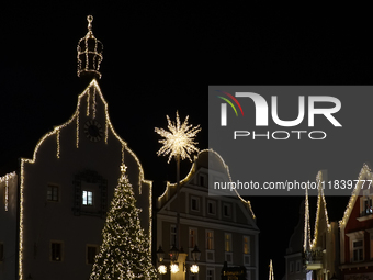 The historic center of Abensberg, Bavaria, Germany, on December 5, 2024, becomes a festive destination during the Christmas season. The trad...