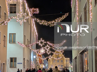 The historic center of Abensberg, Bavaria, Germany, on December 5, 2024, becomes a festive destination during the Christmas season. The trad...