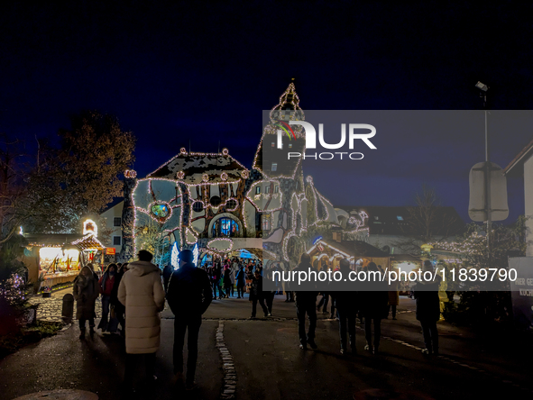 The KunstHaus (Art House) in Abensberg, Bavaria, Germany, on December 5, 2024, features Christmas illumination with its extremely sloping to...