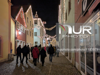 The historic center of Abensberg, Bavaria, Germany, on December 5, 2024, becomes a festive destination during the Christmas season. The trad...