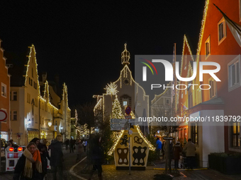 The historic center of Abensberg, Bavaria, Germany, on December 5, 2024, becomes a festive destination during the Christmas season. The trad...