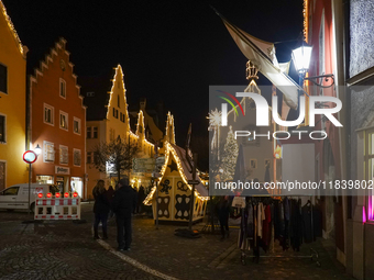 The historic center of Abensberg, Bavaria, Germany, on December 5, 2024, becomes a festive destination during the Christmas season. The trad...