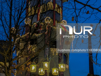 The Kuchlbauer Tower, designed by Friedensreich Hundertwasser, is illuminated for Christmas. In the historic center of Abensberg, Bavaria, G...