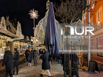 The historic center of Abensberg, Bavaria, Germany, on December 5, 2024, becomes a festive destination during the Christmas season. The trad...