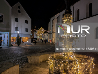 The historic center of Abensberg, Bavaria, Germany, on December 5, 2024, becomes a festive destination during the Christmas season. The trad...