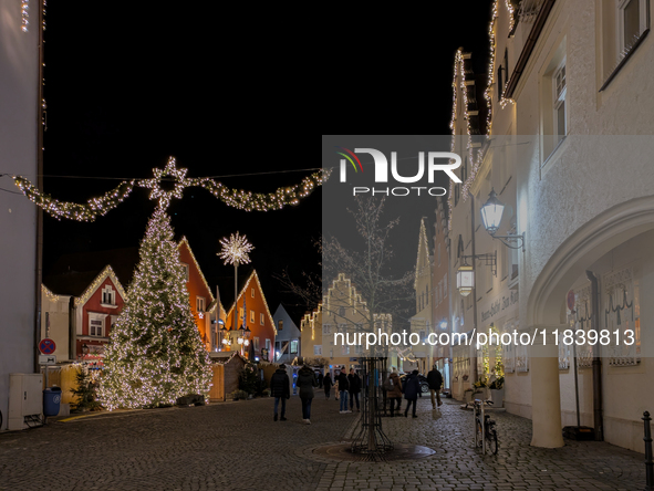 The historic center of Abensberg, Bavaria, Germany, on December 5, 2024, becomes a festive destination during the Christmas season. The trad...