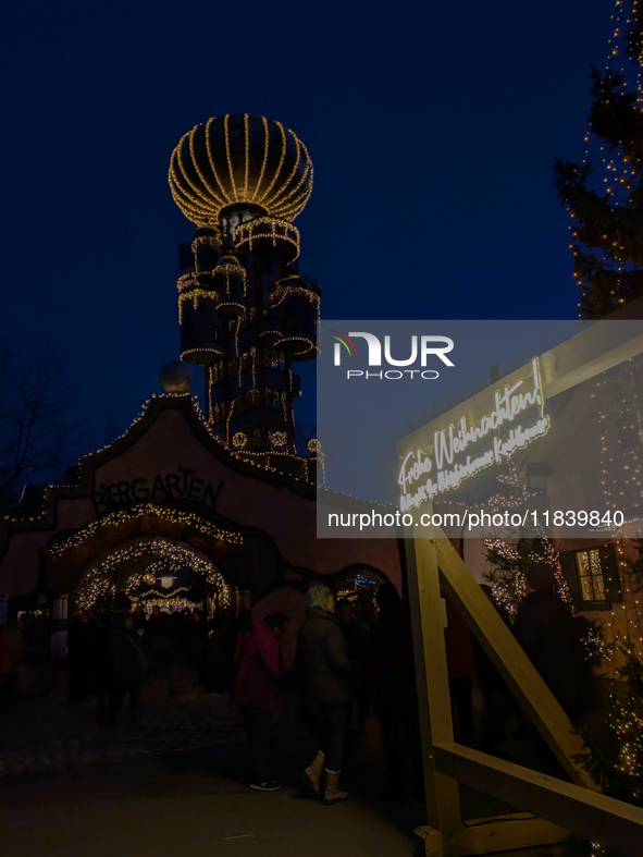 The Kuchlbauer Tower, designed by Friedensreich Hundertwasser, is illuminated for Christmas. In the historic center of Abensberg, Bavaria, G...