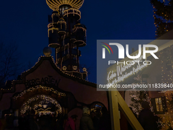 The Kuchlbauer Tower, designed by Friedensreich Hundertwasser, is illuminated for Christmas. In the historic center of Abensberg, Bavaria, G...