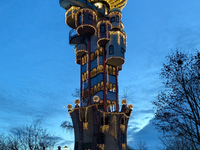 The Kuchlbauer Tower, designed by Friedensreich Hundertwasser, is illuminated for Christmas. In the historic center of Abensberg, Bavaria, G...