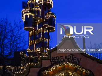 The Kuchlbauer Tower, designed by Friedensreich Hundertwasser, is illuminated for Christmas. In the historic center of Abensberg, Bavaria, G...