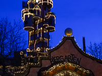 The Kuchlbauer Tower, designed by Friedensreich Hundertwasser, is illuminated for Christmas. In the historic center of Abensberg, Bavaria, G...