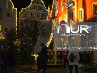 The historic center of Abensberg, Bavaria, Germany, on December 5, 2024, becomes a festive destination during the Christmas season. The trad...