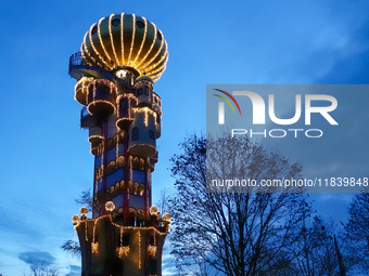 The Kuchlbauer Tower, designed by Friedensreich Hundertwasser, is illuminated for Christmas. In the historic center of Abensberg, Bavaria, G...