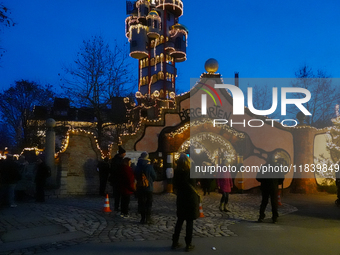 The Kuchlbauer Tower, designed by Friedensreich Hundertwasser, is illuminated for Christmas. In the historic center of Abensberg, Bavaria, G...