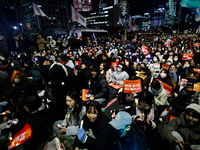 Thousands of citizens gather across from the National Assembly to demand the impeachment of President Yoon Suk-yeol in Seoul, South Korea, o...