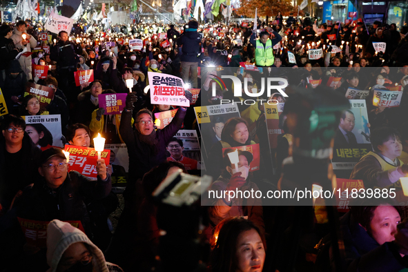 Thousands of citizens gather across from the National Assembly to demand the impeachment of President Yoon Suk-yeol in Seoul, South Korea, o...