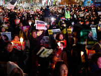 Thousands of citizens gather across from the National Assembly to demand the impeachment of President Yoon Suk-yeol in Seoul, South Korea, o...